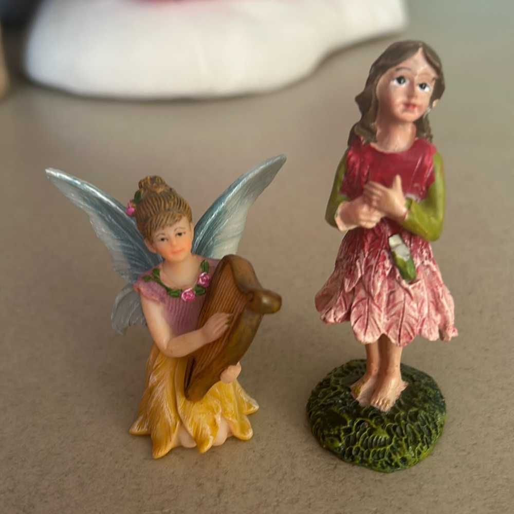 Two adorable fairy figurines